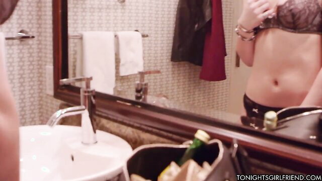 Dani Daniels in lingerie by sink