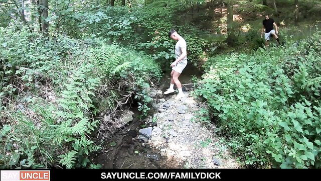 Cute twink stepuncle barebacked by stepbro in forest stream