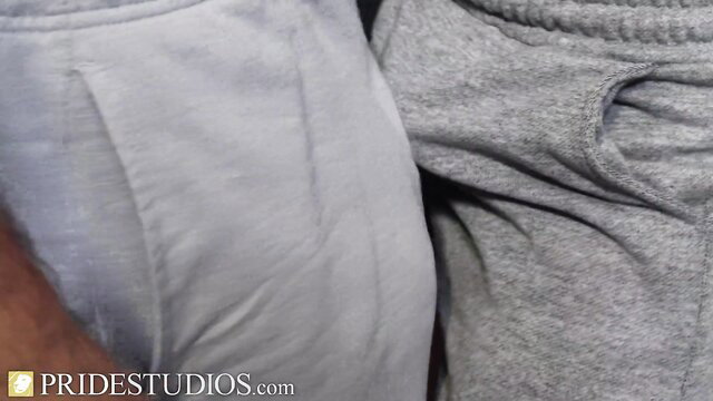 Hot young dude in grey sweatpants bulging huge cock closeup