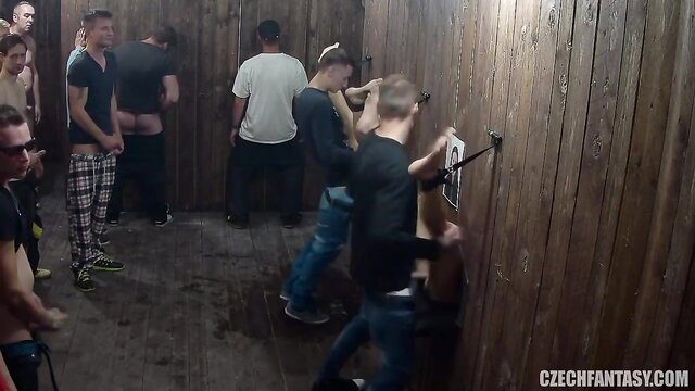 Group sex scene with multiple men and women