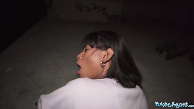 Asian babe spreads pussy wide, takes it deep in abandoned spot