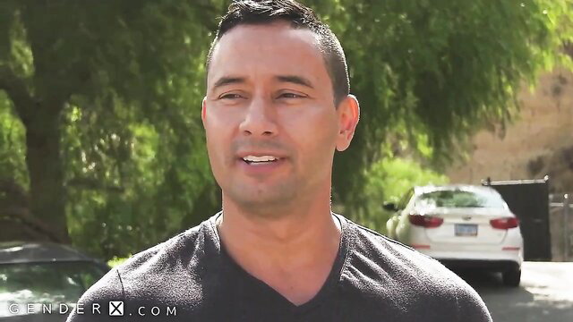 Aspen Brooks smiles outdoors in tight black shirt