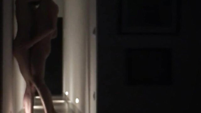 Silhouette of nude neighbor bending over in dark hallway for anal hookup