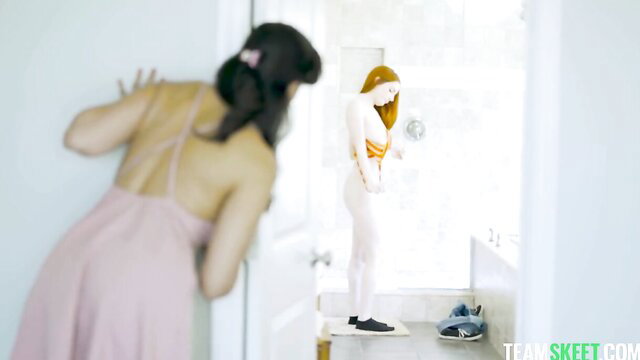 Penny Barber spies on busty redhead Aria Carson showering nude