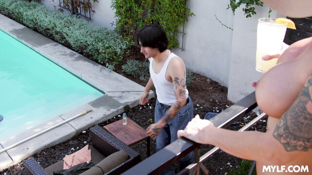 Alexis Malone's huge tits exposed outdoors with Elias Cash at poolside