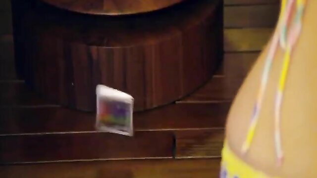 Asian bikini babe sideboob tease with floating card, hot Lan Kwai Fong scene