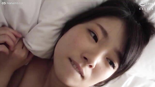 S-Cute Hana lying nude in bed, shy first-time sex gaze, soft JAV amateur