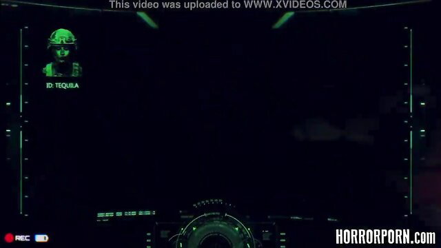 Horrorporn Zombie in green night vision HUD helmet view, dark sci-fi horror