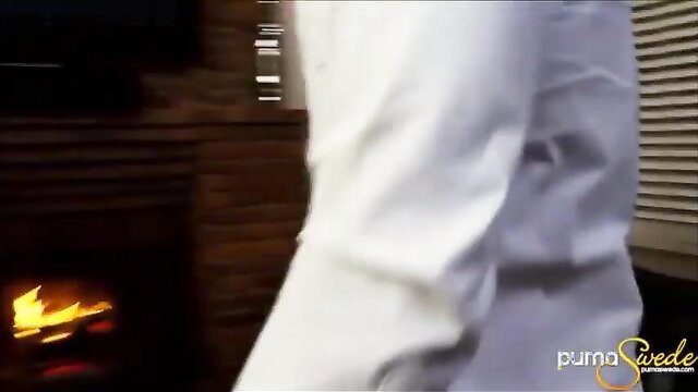 Puma Swede in white pants by fireplace, Kelly Madison 3way