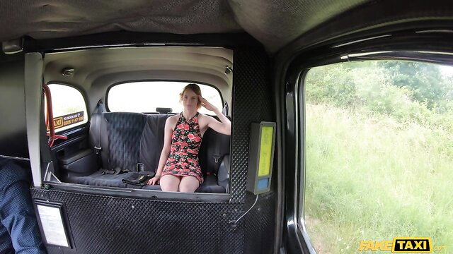 Skinny redhead Ariela Donovan in floral dress in Fake Taxi cab