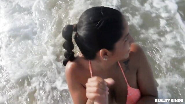 Amy Amor in pink bikini with beach waves, Reality Kings