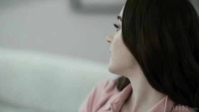 Hazel Moore profile view in pink top, seductive gaze