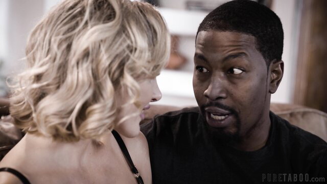 Kenzie Anne gazes at Isiah Maxwell in kinky Adult Time threesome tease