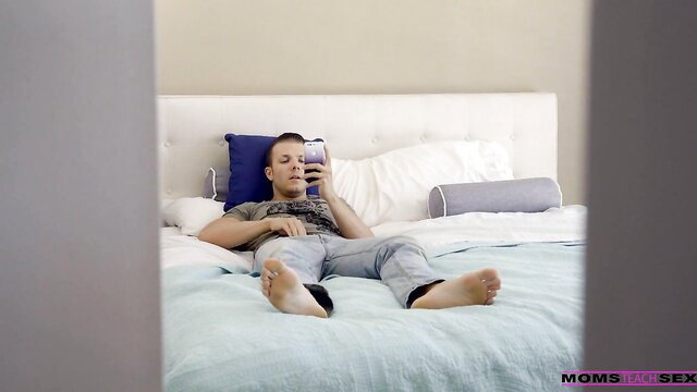 Emily Willis lying on bed taking selfie in jeans, hot pantyhose POV tease