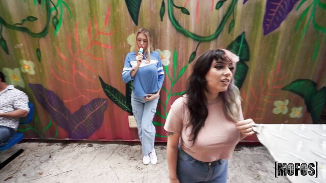 Carly Rae in pink top and jeans licks ice cream with friend at Mofos