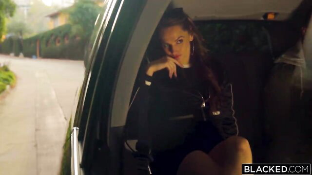 Tori Black in car, seductive pose, black dress, Blacked.com