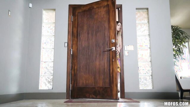 Kristen Scott peeking seductively from behind open door Mofos