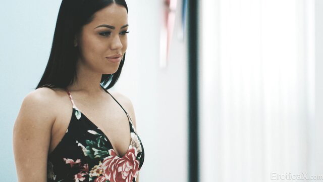 Alina Lopez in sexy black floral dress, seductive gaze