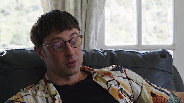 Ricky Spanish lounging shirtless in patterned shirt, casual hot look