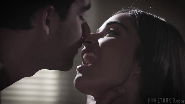 Emily Willis kissed passionately by man in intense closeup