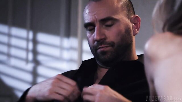 Bald muscular man in suit buttoning shirt with woman in Pure Taboo Lessons In Business