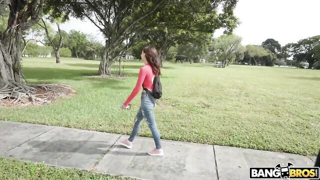 Hot Latina teen in pink top and jeans walks in park on Bang Bus