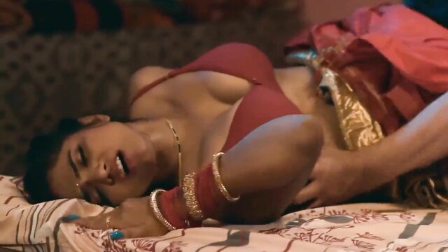 Indian babe in red saree blouse groped passionately on bed