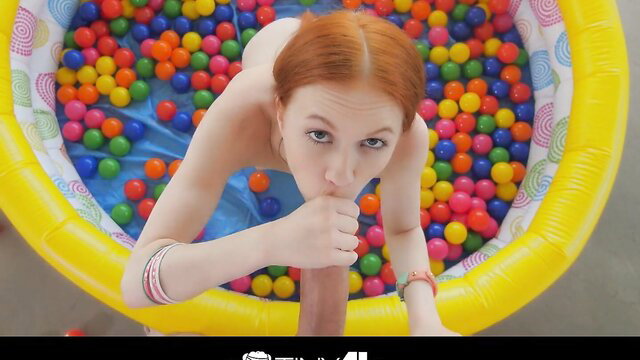 Dolly Little nude in ball pit, sucking dildo solo play
