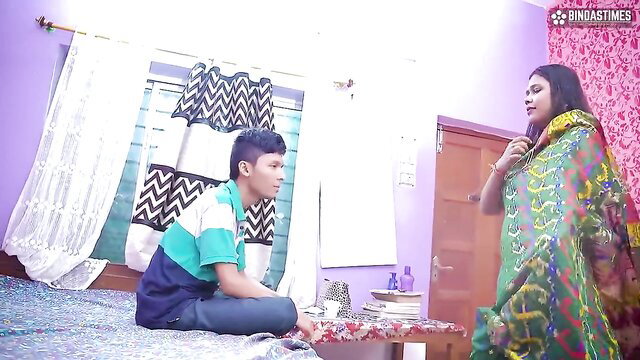 Desi stepmom in saree seduces stepson on bed for steamy action