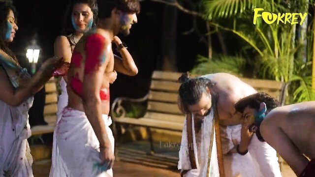 Desi Holi orgy: topless Indian bhabhi, aunty smear colors on naked men