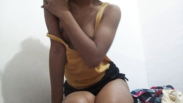 Cute 18yo desi girl23 in yellow tank top and black shorts, teasing pose