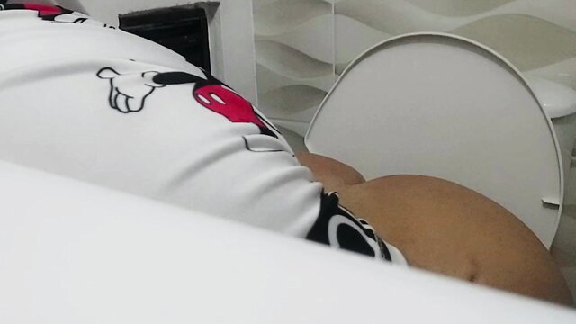 Stepmom's beautiful thick ass in Mickey Mouse pajamas bending over toilet