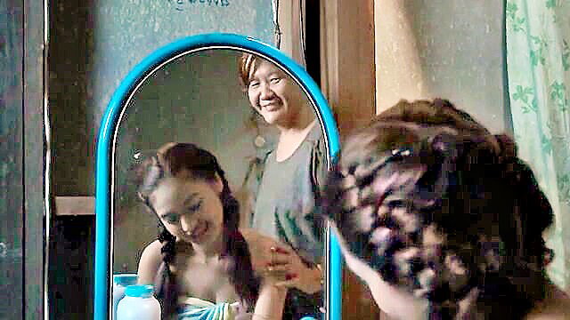 Asian teen Cherry Samkhok topless pigtails with mature smiling mom, 2013
