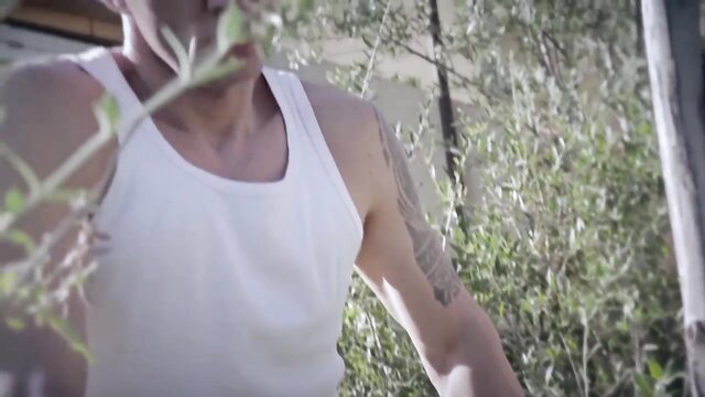 Hot tattooed man in white tank top, Chains Suzie Q adult video thumbnail