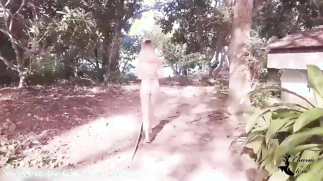 Nude Asian woman walking outdoors in tropical garden, bareback creampie vibe