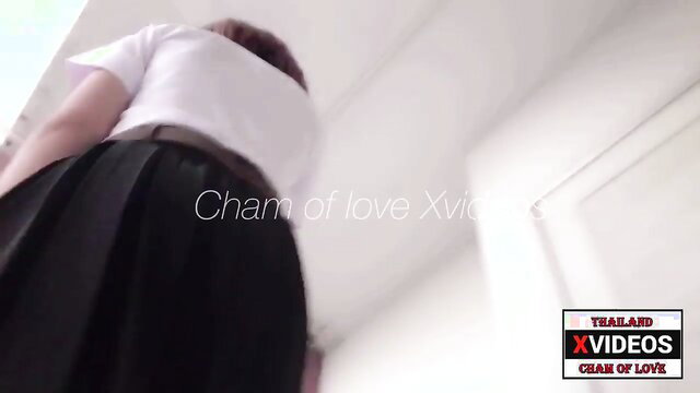 Asian teen in schoolgirl skirt bends over, showing huge ass in hotel