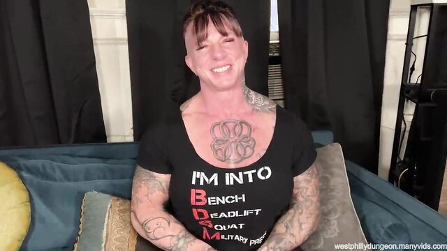 Brooke Diesel pink-haired tattooed BBW in bench deadlift tank top