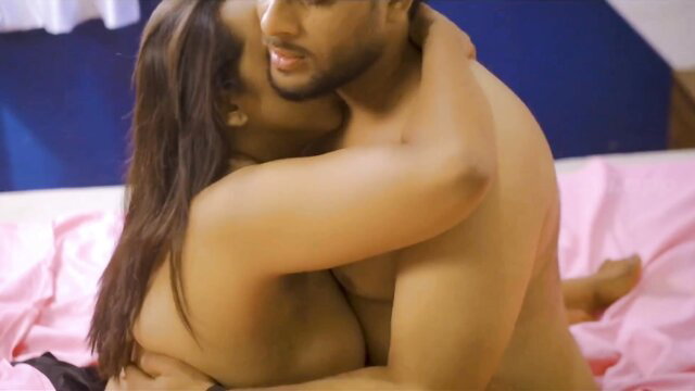 Desi Indian bhabhi passionately embraces nude hunk in bed embrace