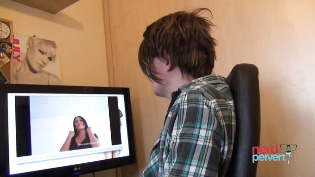 Emo guy watches naughty brunette on cam exposing shaved pussy