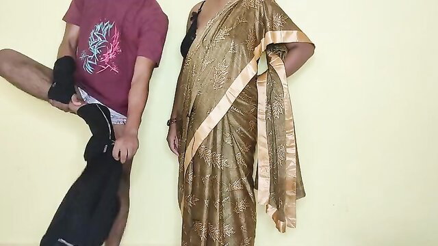 Desi aunty in gold saree with man in briefs grabbing her ass