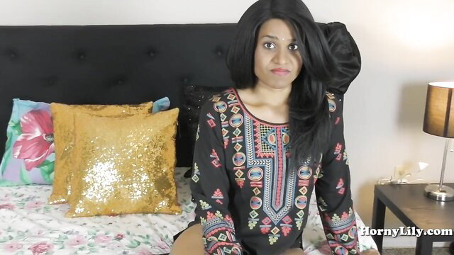 Horny Lily in embroidered dress teases with big ass on bed