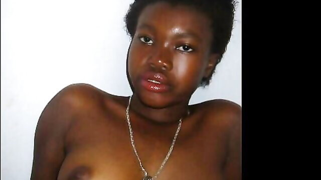 Curvy black babe with huge tits topless closeup