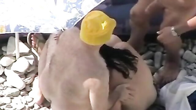 Nudist beach cam spies on horny group fucking outdoors