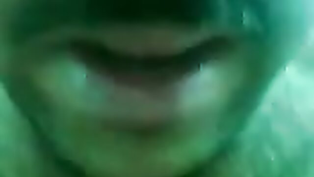 Amateur Punjabi mamma's blurry green-tinted closeup mouth shot