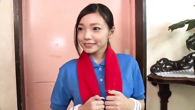 Wato Kokoro in blue polo shirt and red scarf, smiling cutely