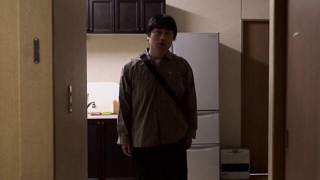 Japanese young man in kitchen, casual shirt pants bag, JAV thumbnail