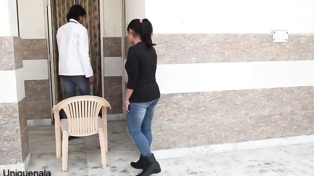 Hot Desi MILF in tight jeans and boots with patient devar at door
