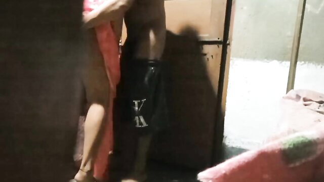 Tamil Desi Aunty in red dress grabs hunk's bulge in wild MMS