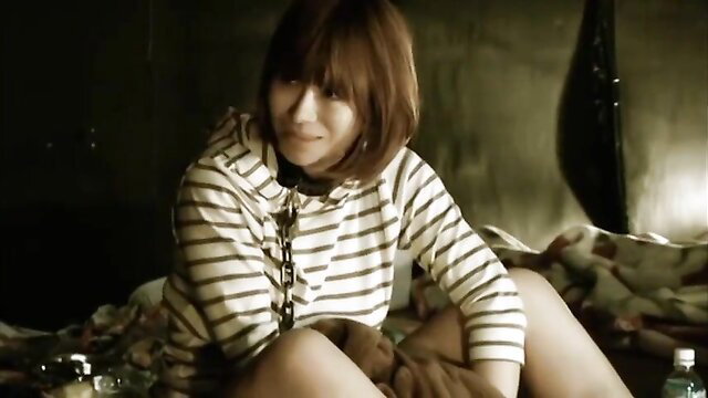 Asian woman with Chinese features in hoodie on bed, Marionette gangbang thumbnail