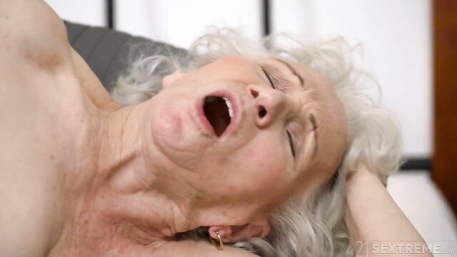 Dirty old granny Norma in ecstasy, mouth open wide in hardcore teaming